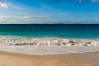 Indian Ocean surf surging onto a sandy tropical beach Anse Macquereau Beach-Seychelles Art Print
